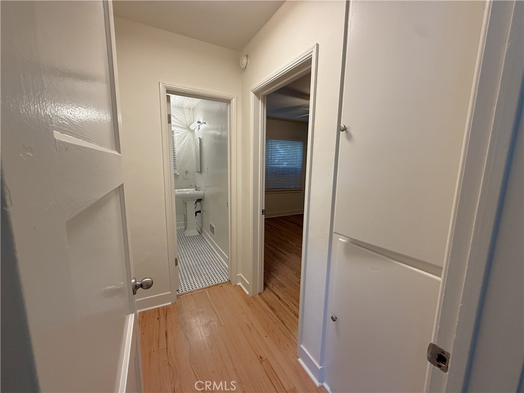 1007 9th Street, Unit 1 Santa Monica, CA 90403 - Photo 13 of 17 a view of hallway with wooden floor
