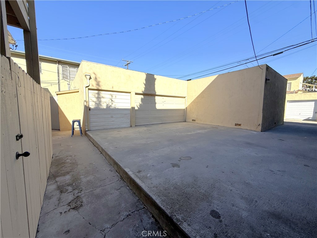 1007 9th Street, Unit 1 Santa Monica, CA 90403 - Photo 17 of 17 a view of a room with a sink and wooden walls