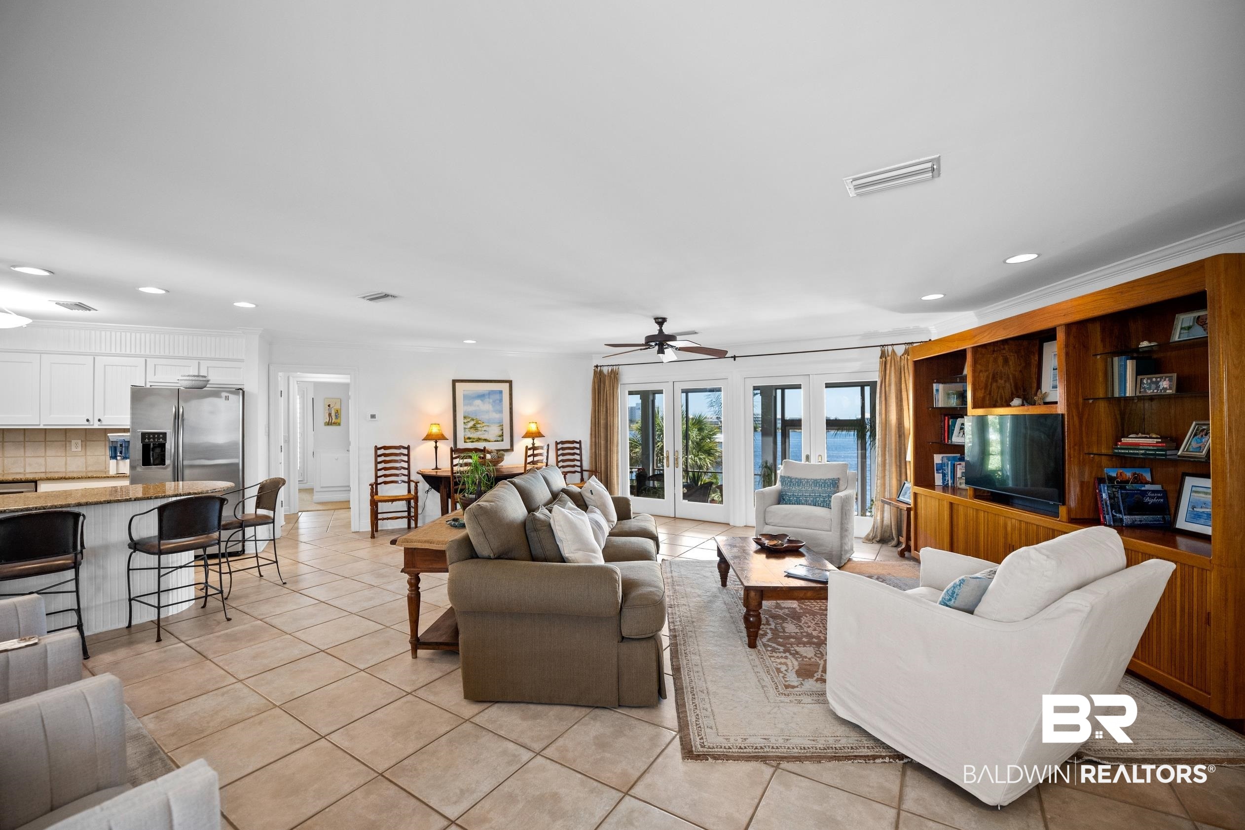 31304 River Road Orange Beach, AL 36561 - Photo 3 of 78 Living area featuring light tile patterned floors, ceiling fan, recessed lighting, and visible vents