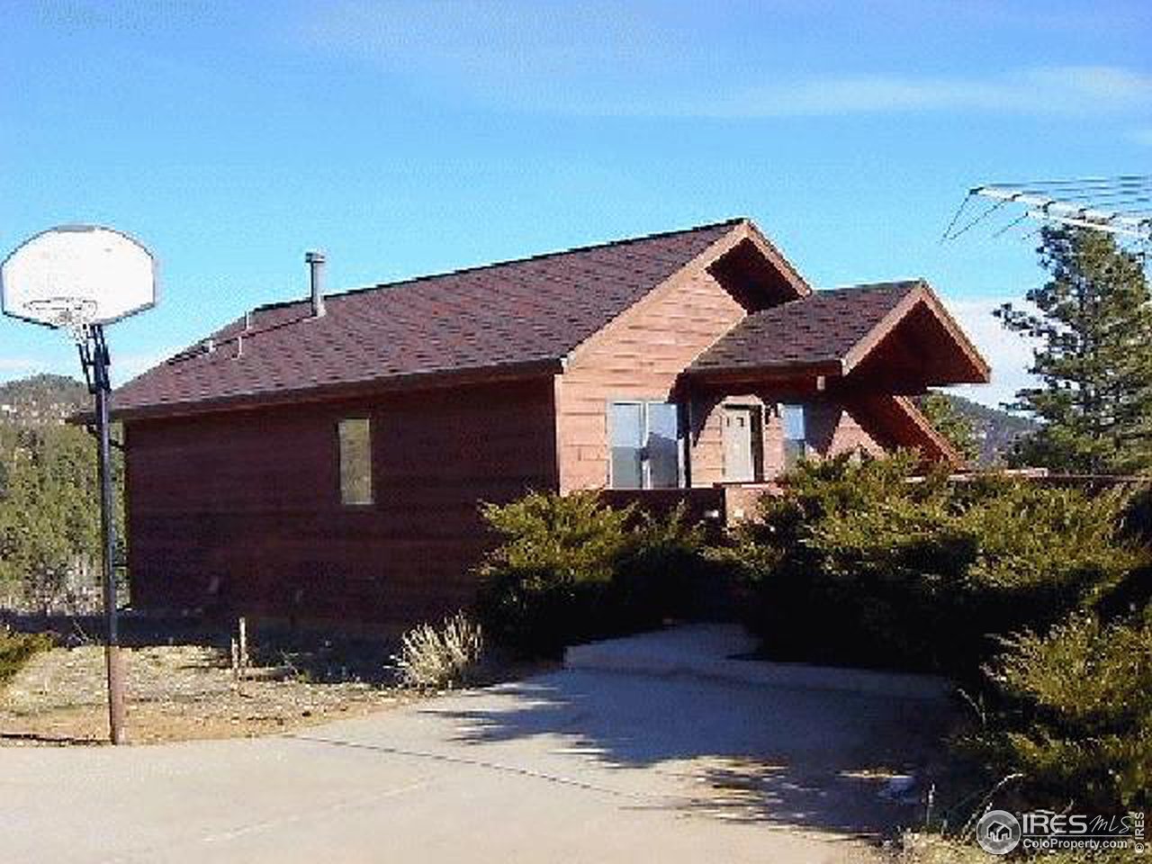 62 Chapman Road Boulder, CO 80302 - Photo 2 of 10 a front view of a house with a yard