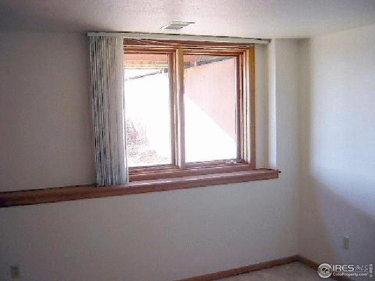 62 Chapman Road Boulder, CO 80302 - Photo 9 of 10 a view of a window in an empty room