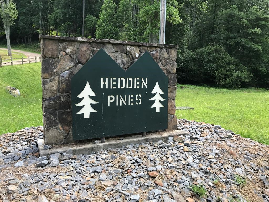 144 Morris Rdg Drive Murphy, NC 28906 - Photo 2 of 11 a sign that is sitting on a brick wall