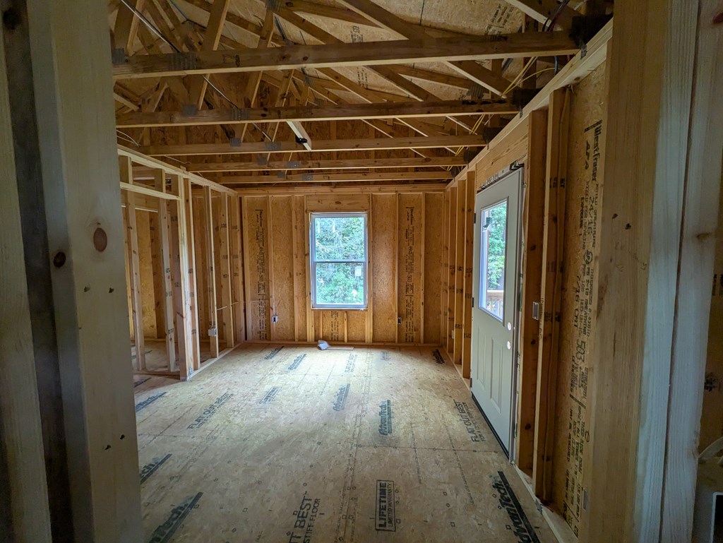 144 Morris Rdg Drive Murphy, NC 28906 - Photo 6 of 11 a view of a room with wooden walls