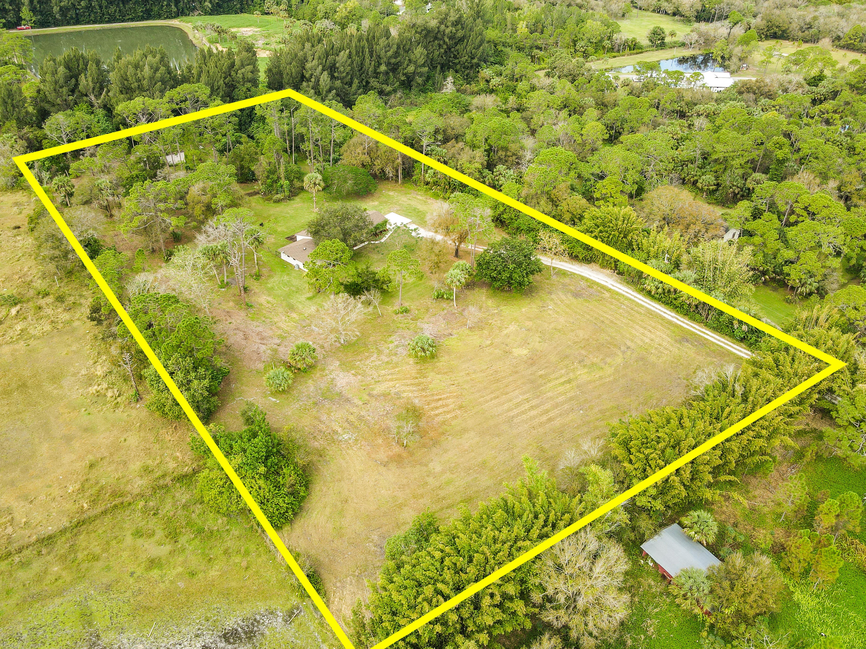 17427 Jupiter Farms Road Jupiter, FL 33478 - Photo 49 of 59 17427JupiterFarmsRoadAerial(5)_marked
