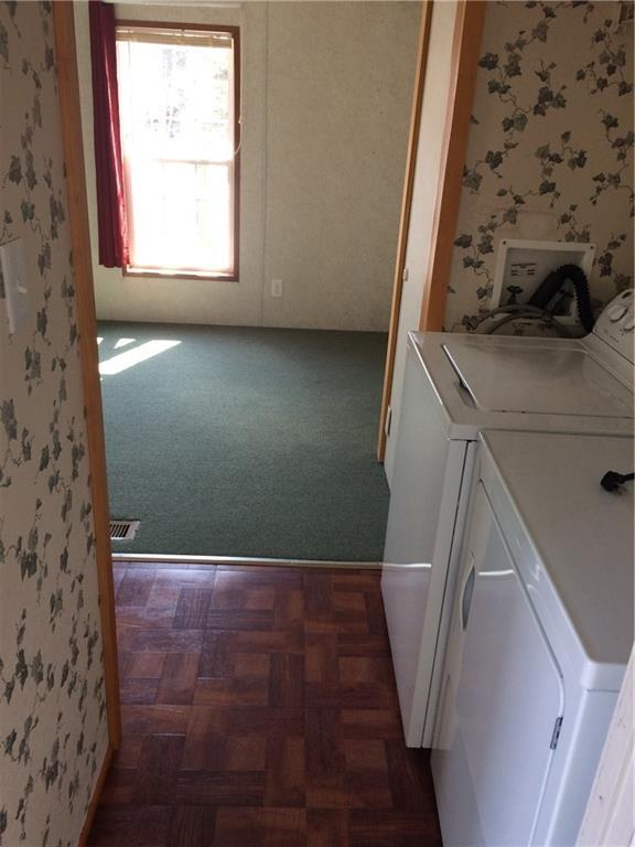 78 Cape Road Seal Cove, ME 04674 - Photo 18 of 24 Laundry area between the kitchen and...
