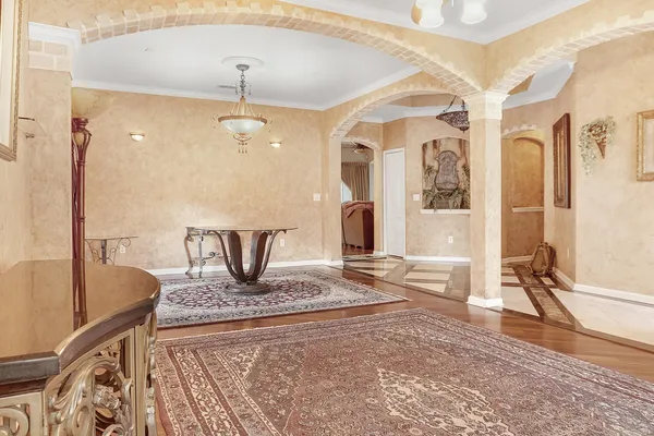 a living room with a rug