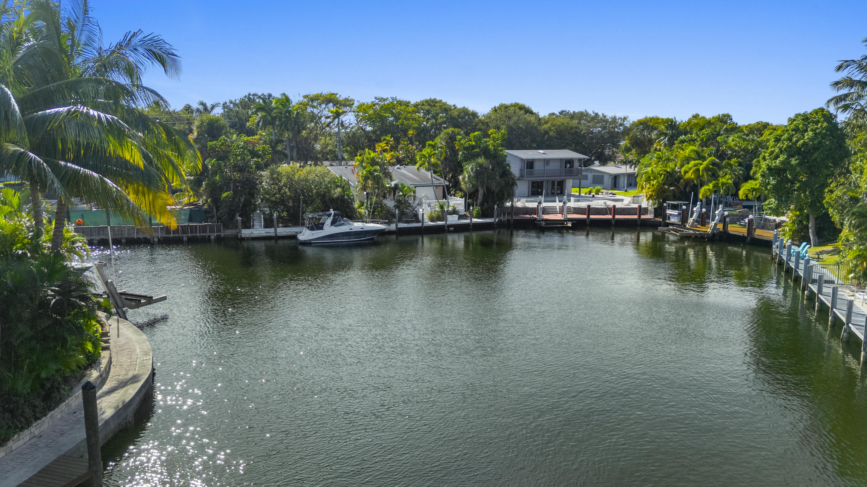 2311 Northeast 47th Street Lighthouse Point, FL 33064 - Photo 3 of 40 a view of a lake with houses