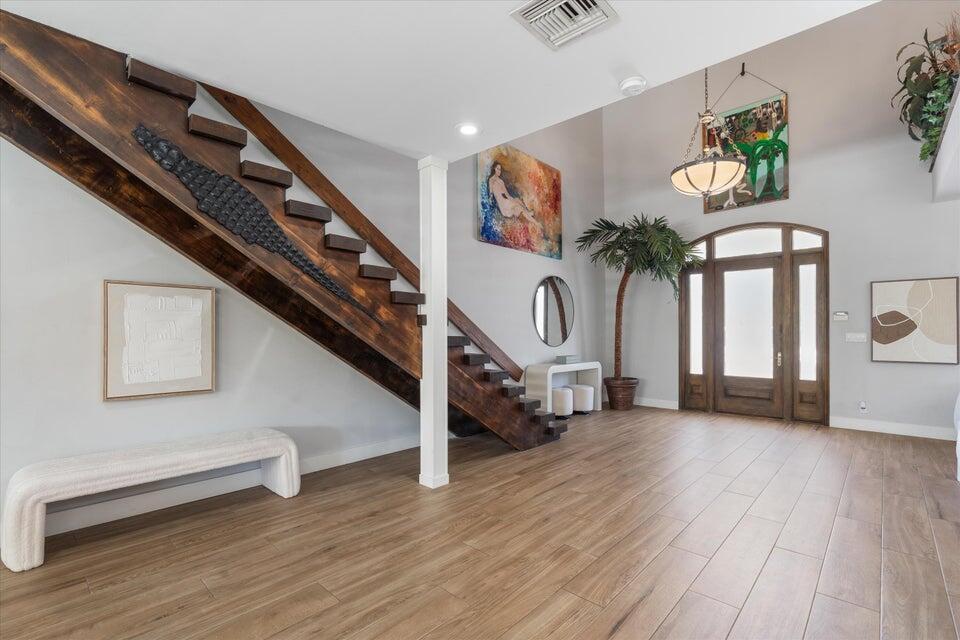 2311 Northeast 47th Street Lighthouse Point, FL 33064 - Photo 33 of 40 a view of an entryway with wooden floor
