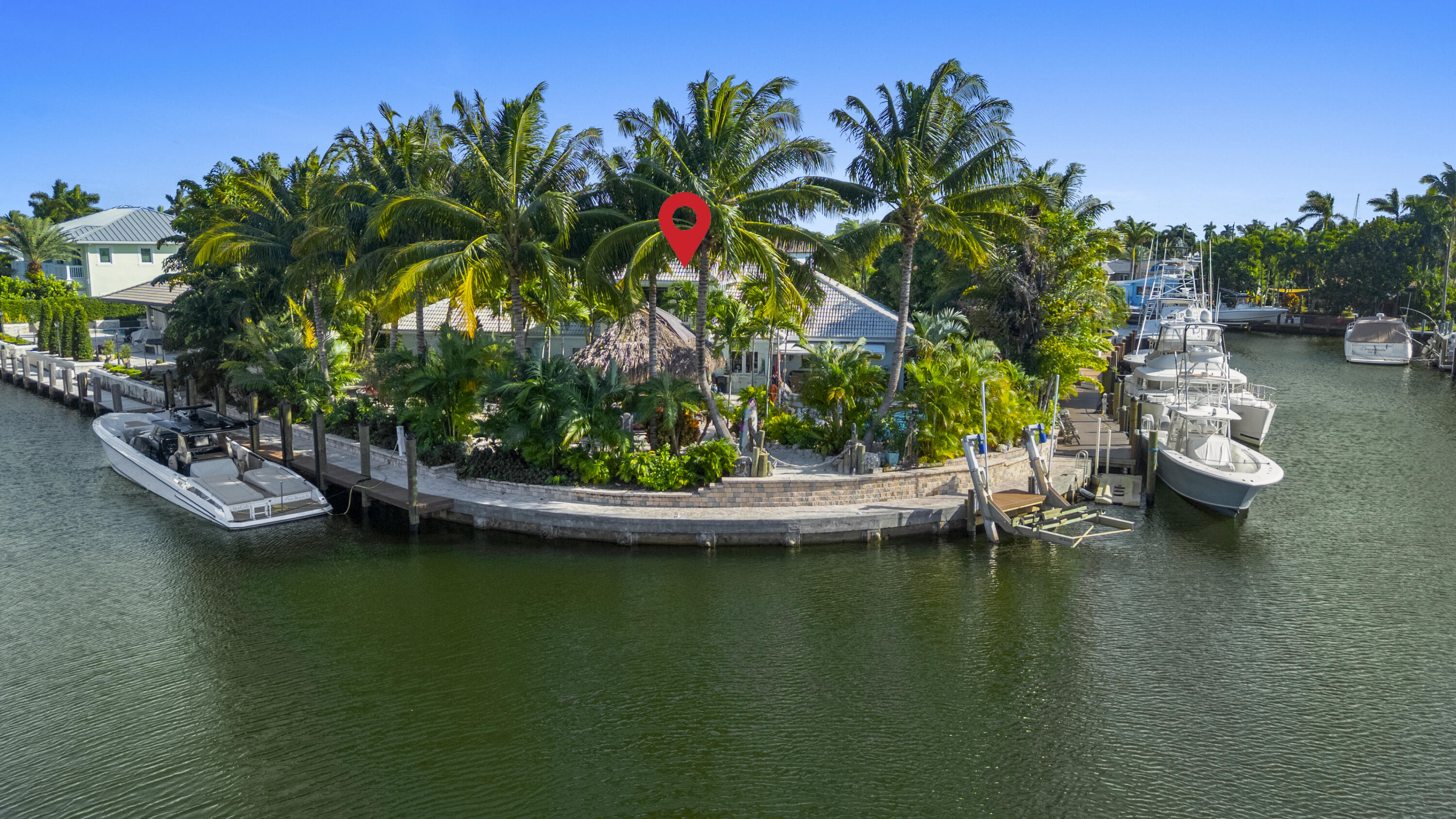 2311 Northeast 47th Street Lighthouse Point, FL 33064 - Photo 5 of 40 a view of a lake with a house