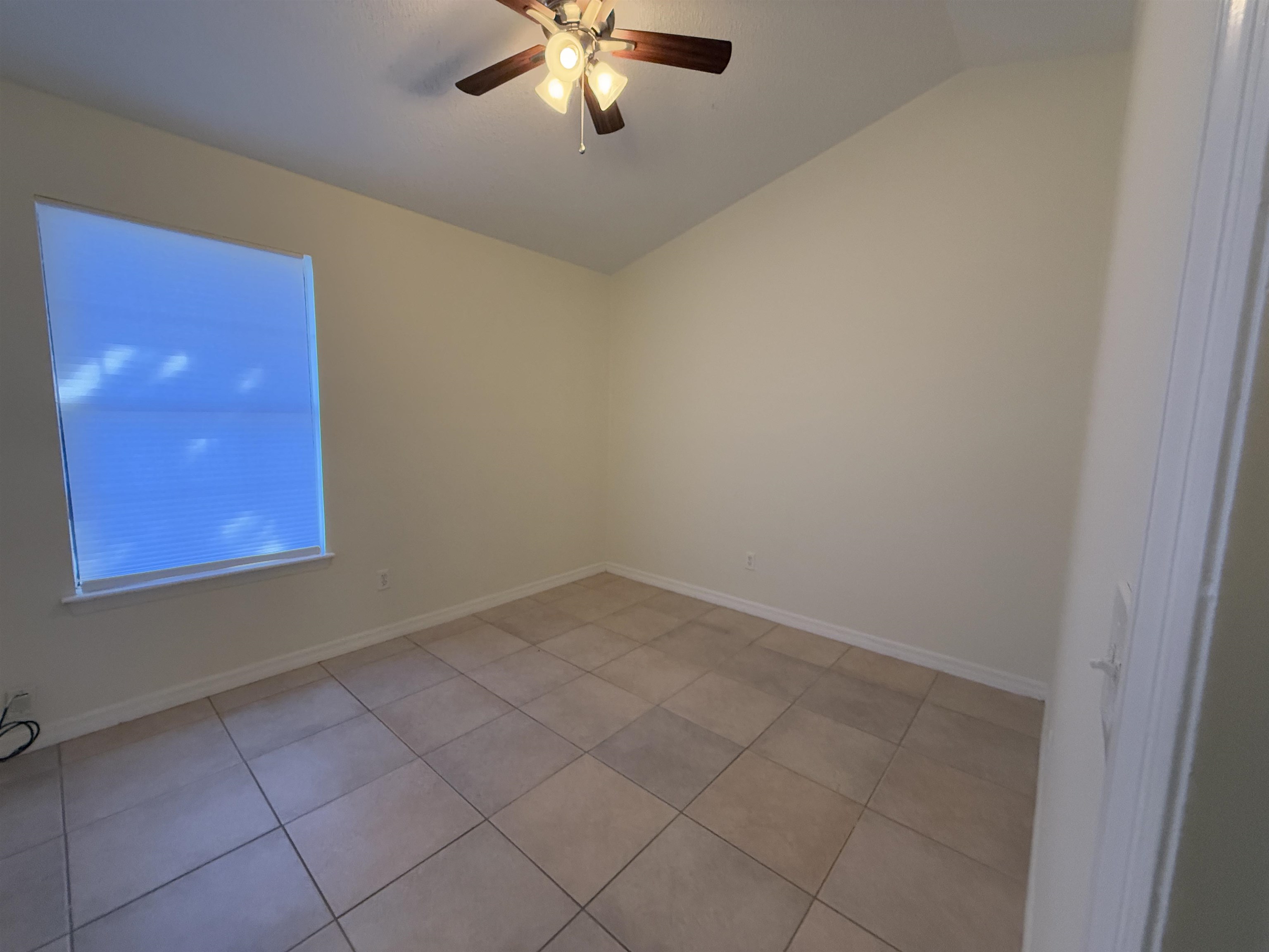 3 Agnes Circle St. Augustine, FL 32080 - Photo 12 of 15 an empty room with chandelier fan