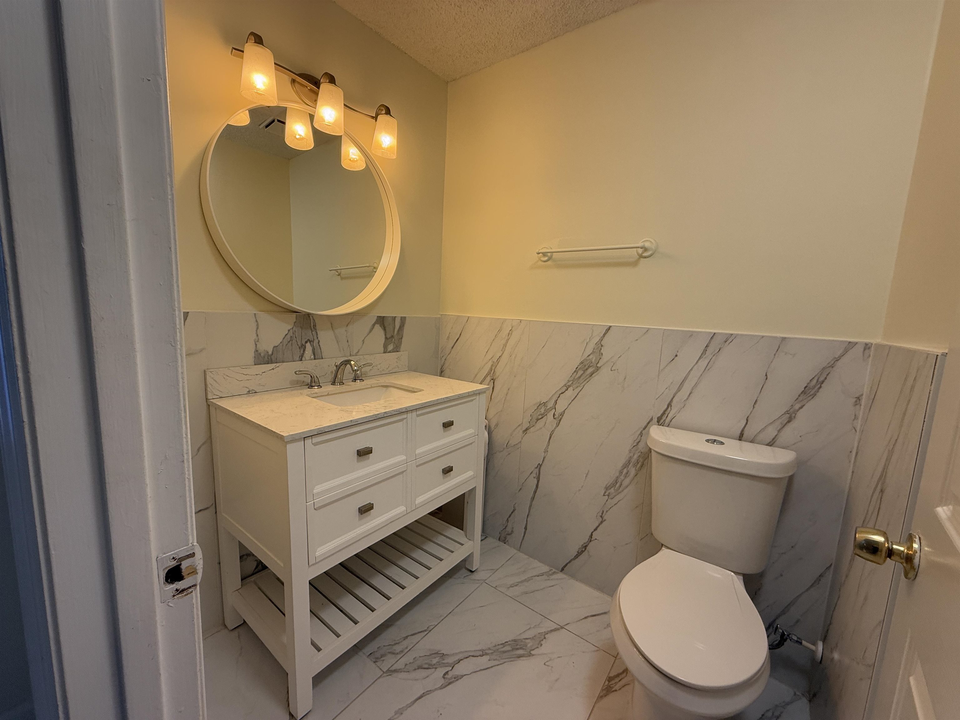 3 Agnes Circle St. Augustine, FL 32080 - Photo 14 of 15 a bathroom with a toilet a sink and mirror