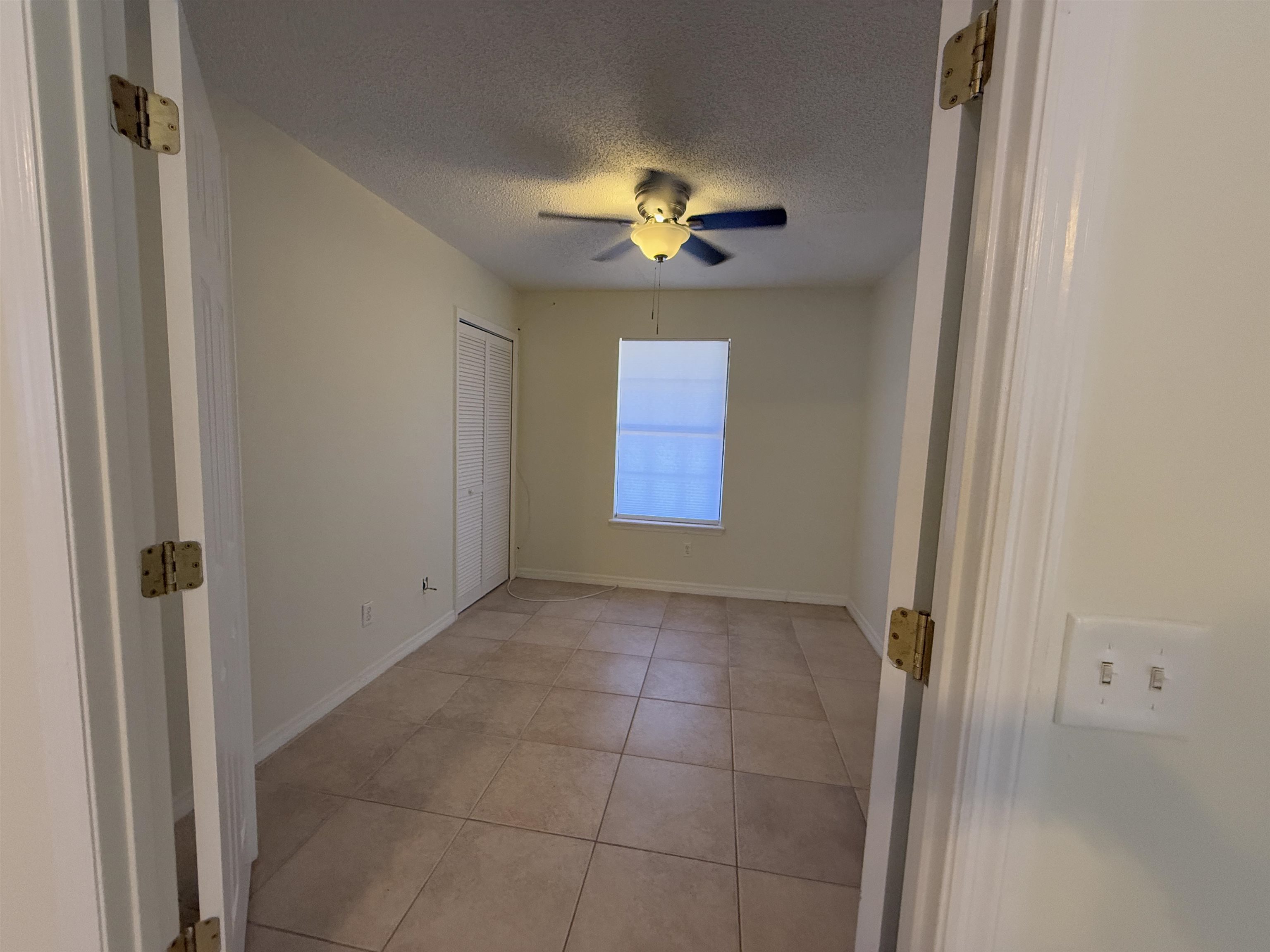 3 Agnes Circle St. Augustine, FL 32080 - Photo 8 of 15 a view of an empty room with a window