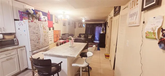a very nice looking dining room with a chair and a table