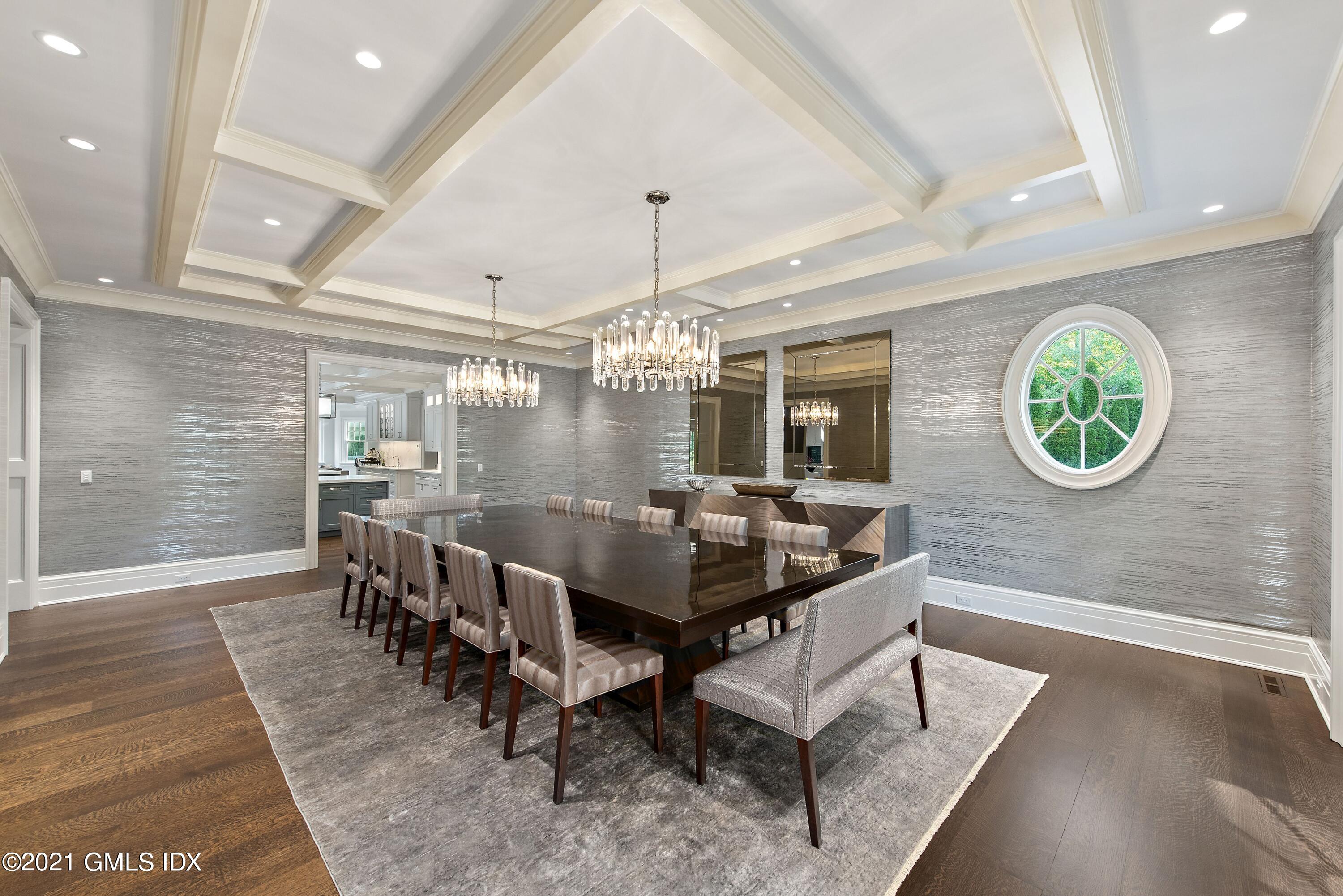 434 Riversville Road Greenwich, CT 06831 - Photo 11 of 47 a view of a dining room with furniture and a chandelier