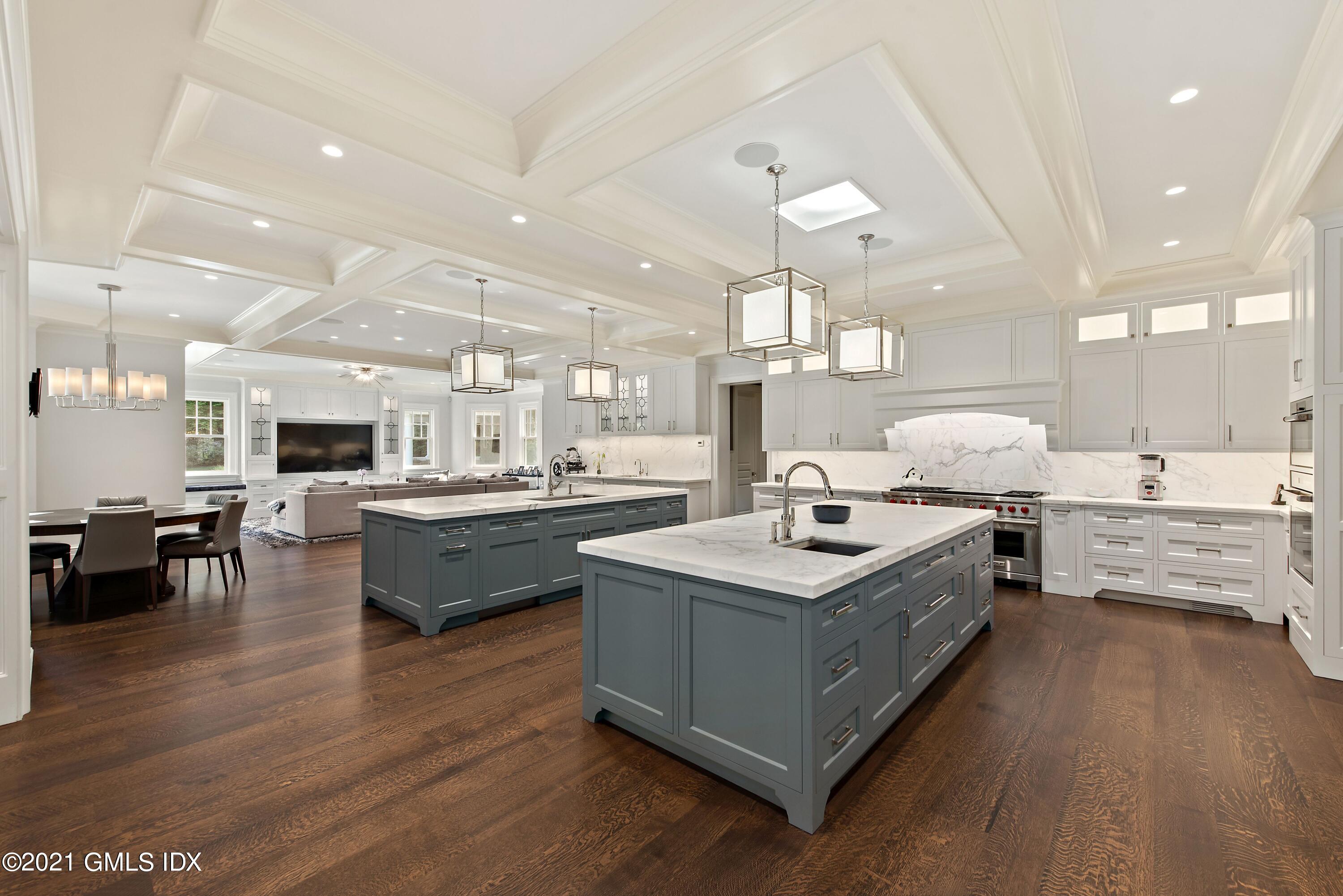 434 Riversville Road Greenwich, CT 06831 - Photo 15 of 47 a kitchen with stainless steel appliances a stove top oven and kitchen island