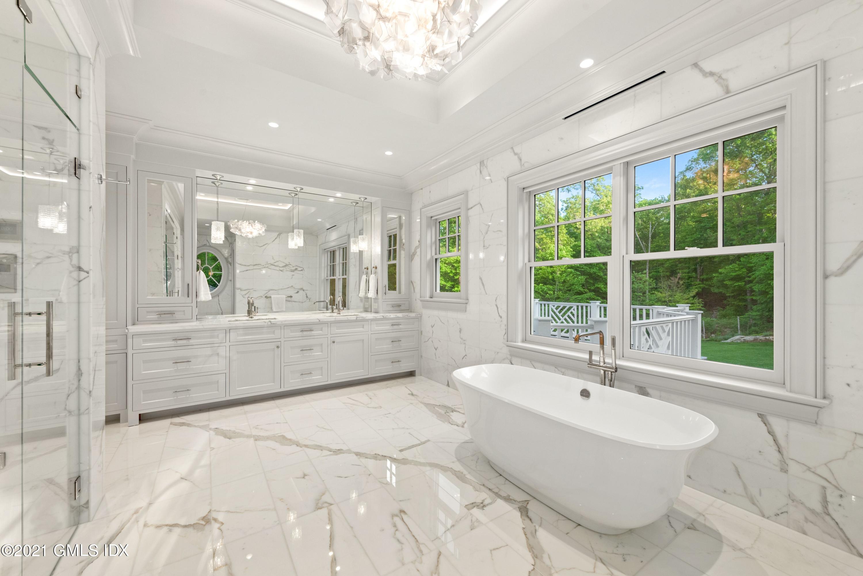 434 Riversville Road Greenwich, CT 06831 - Photo 20 of 47 a bathroom with a bathtub and a sink