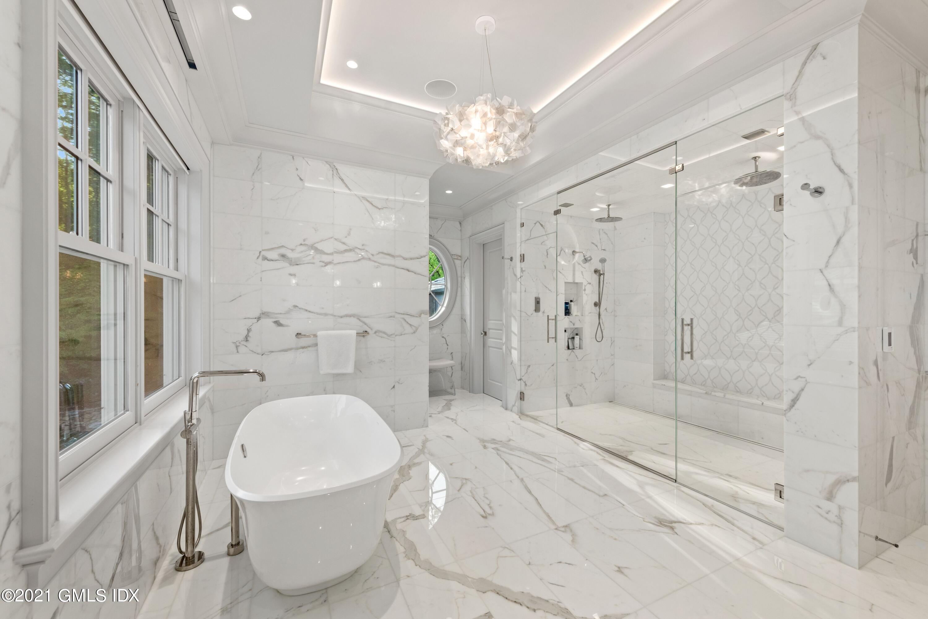 434 Riversville Road Greenwich, CT 06831 - Photo 22 of 47 a bathroom with a granite countertop sink a toilet and shower