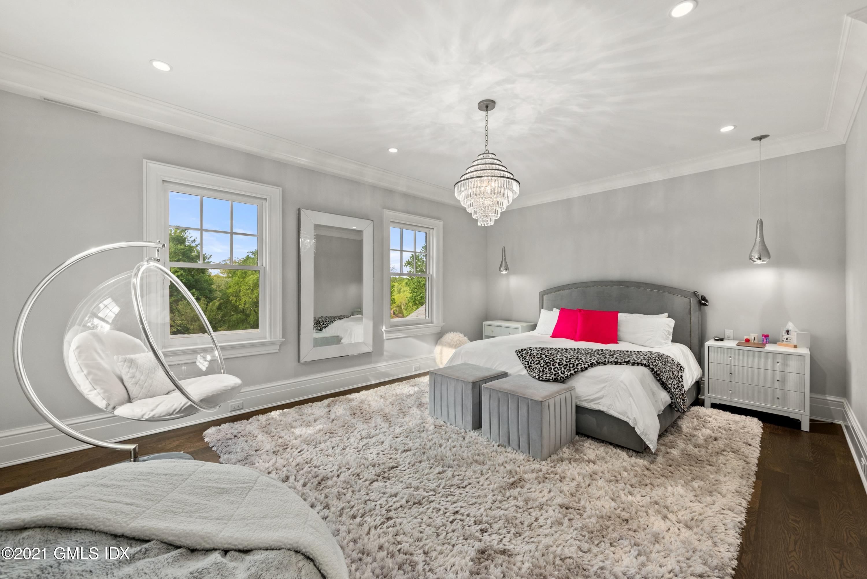 434 Riversville Road Greenwich, CT 06831 - Photo 23 of 47 a living room with furniture and a large window