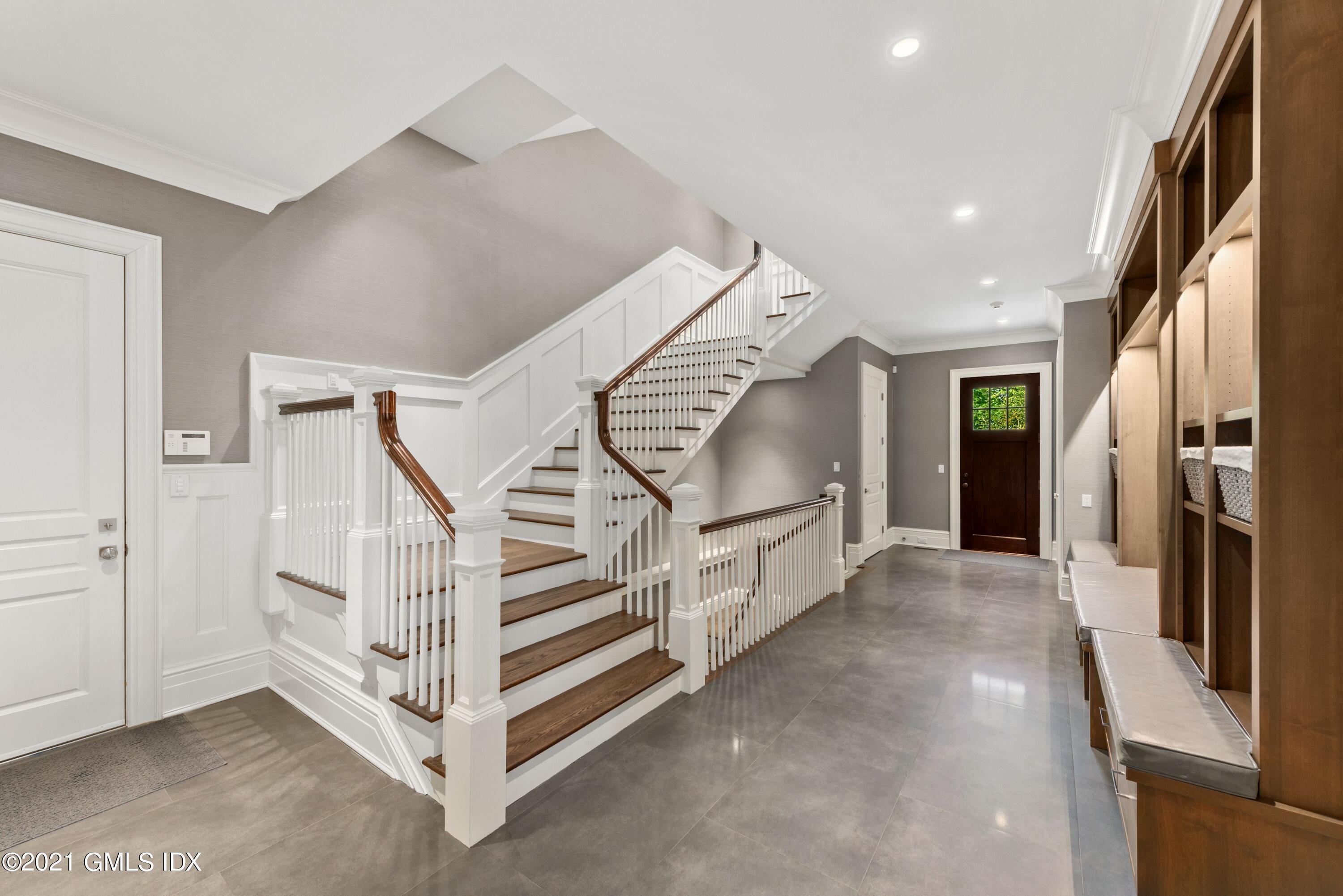 434 Riversville Road Greenwich, CT 06831 - Photo 27 of 47 a view of a hallway with staircase