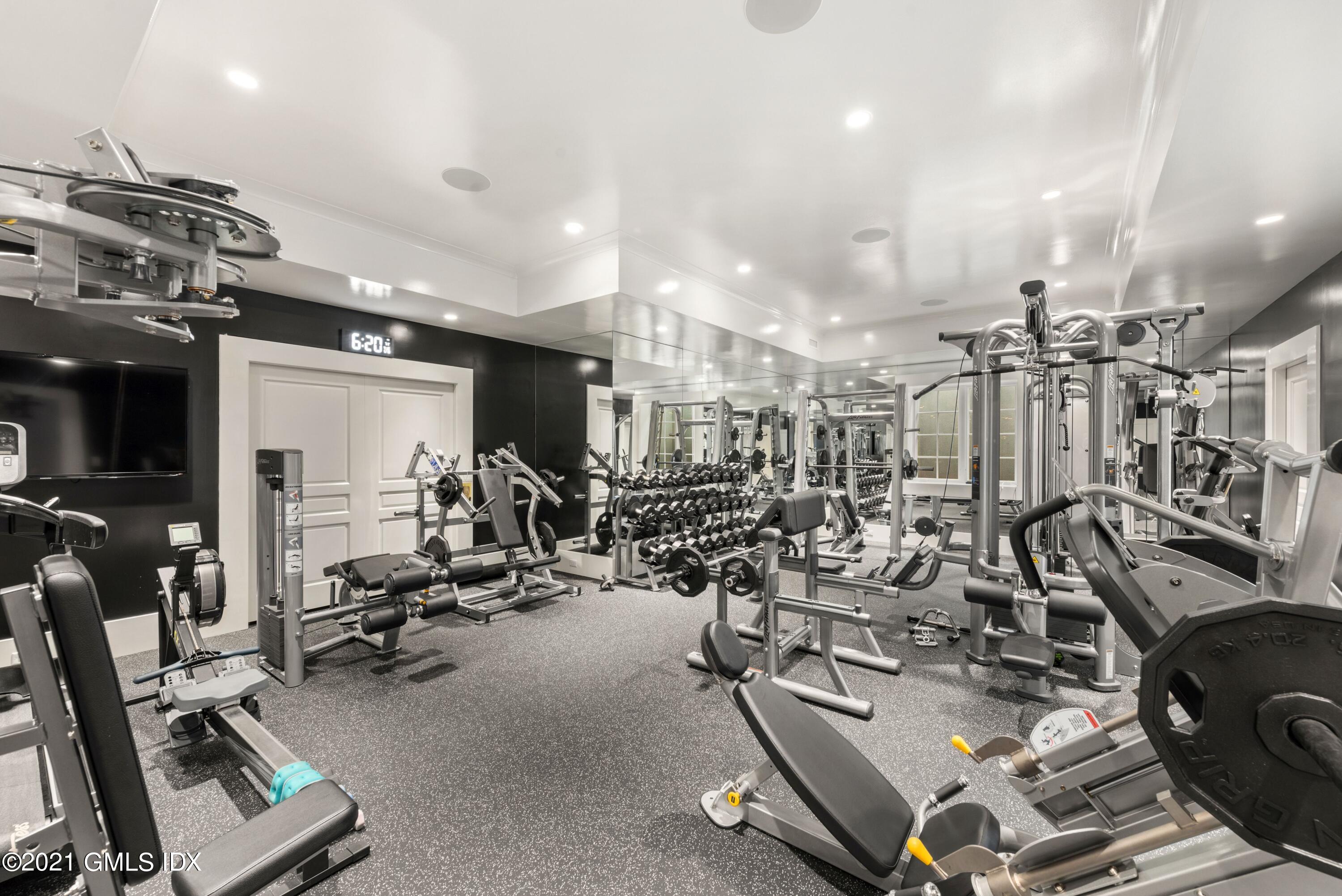 434 Riversville Road Greenwich, CT 06831 - Photo 30 of 47 a view of a room with gym equipment