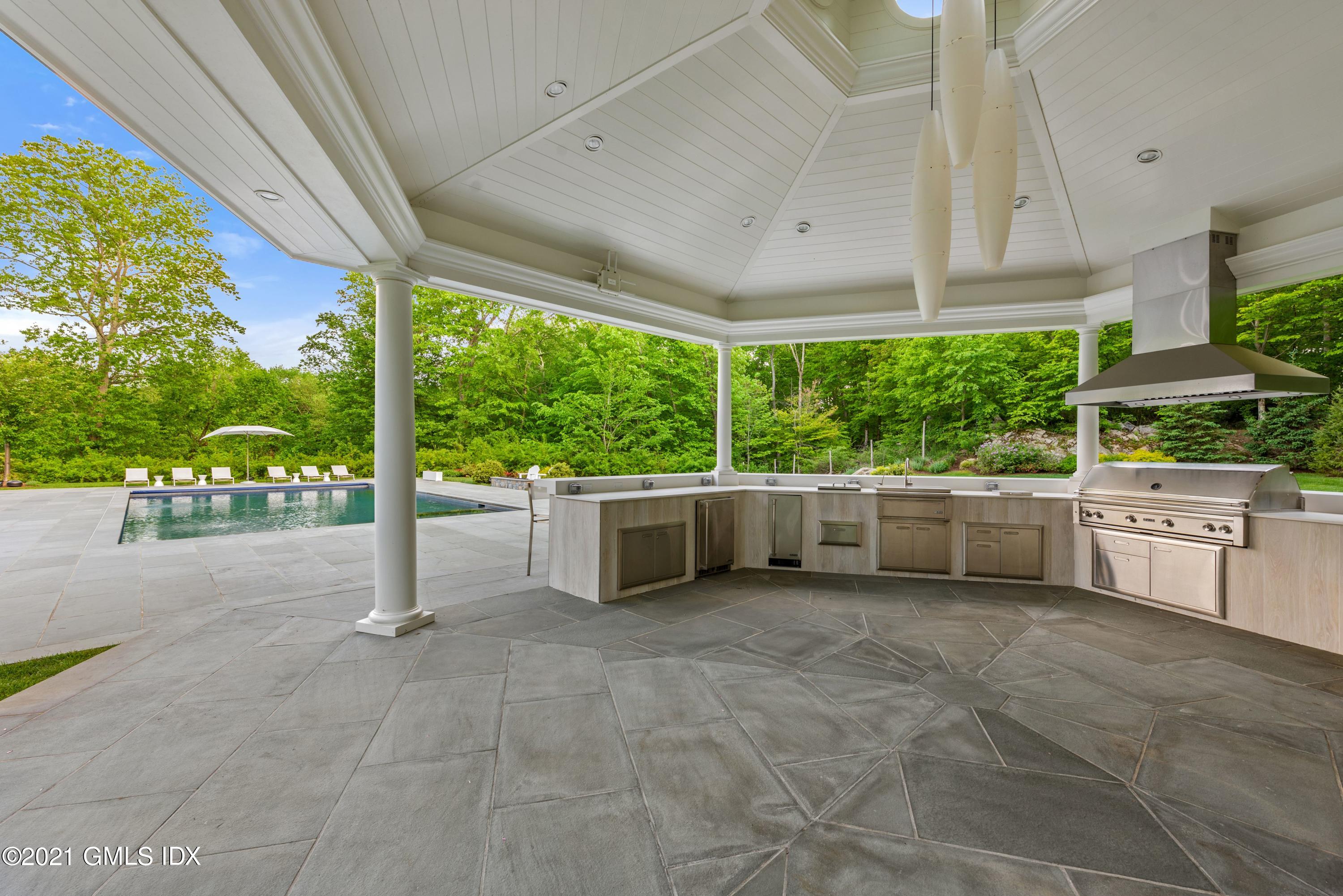 434 Riversville Road Greenwich, CT 06831 - Photo 39 of 47 a view of a porch and garden