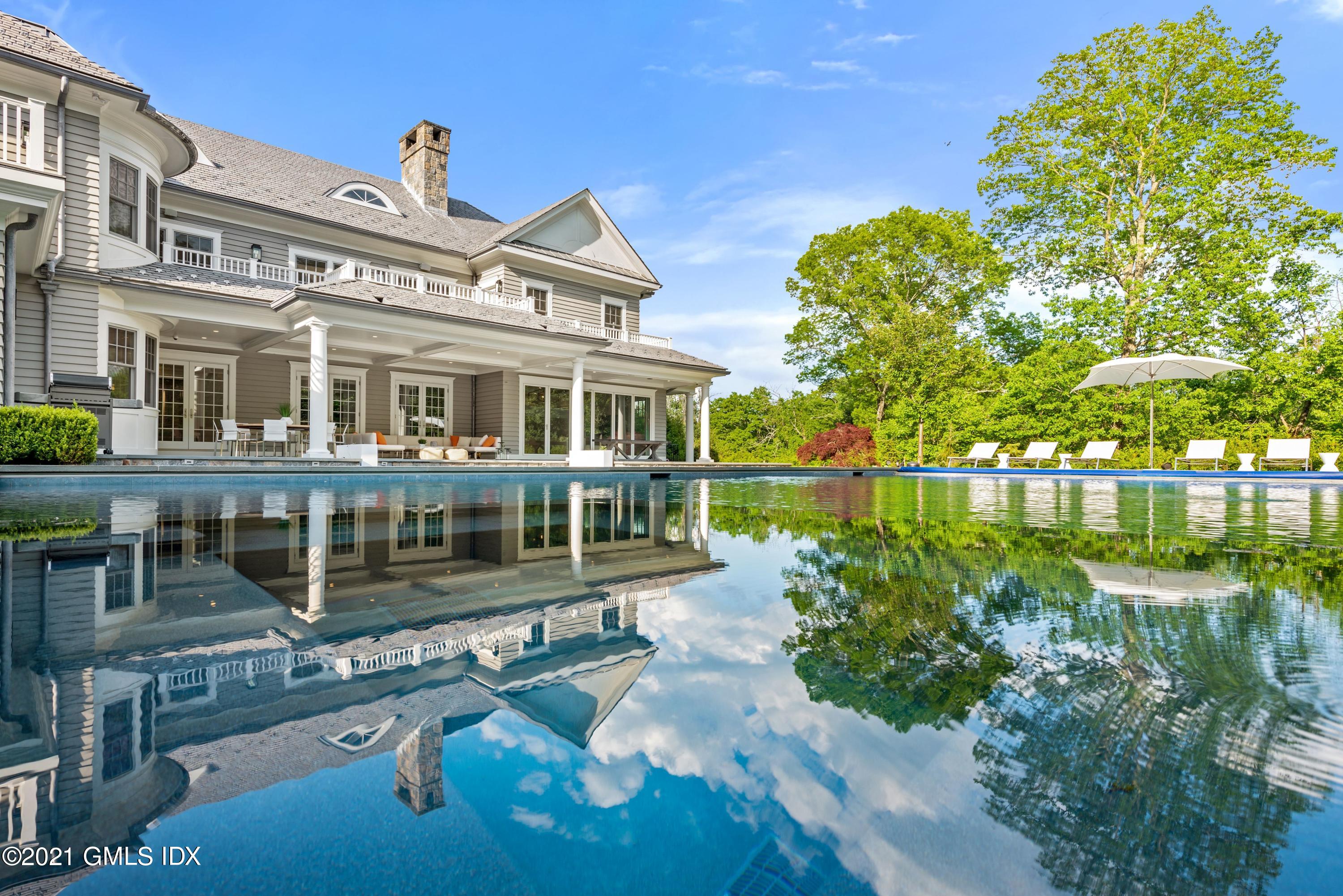 434 Riversville Road Greenwich, CT 06831 - Photo 42 of 47 a view of a house with lake view