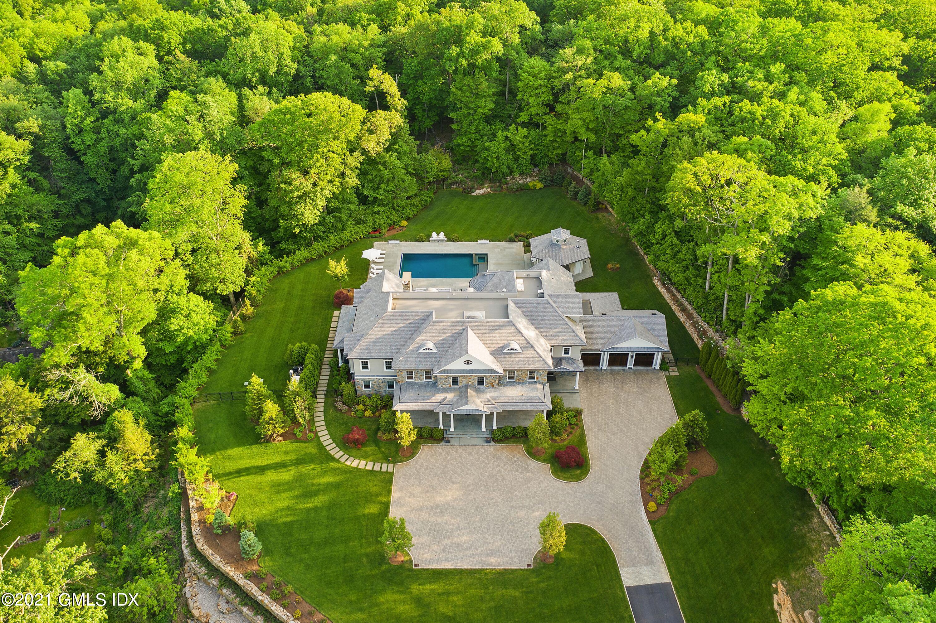 434 Riversville Road Greenwich, CT 06831 - Photo 46 of 47 an aerial view of a house with yard swimming pool and outdoor seating