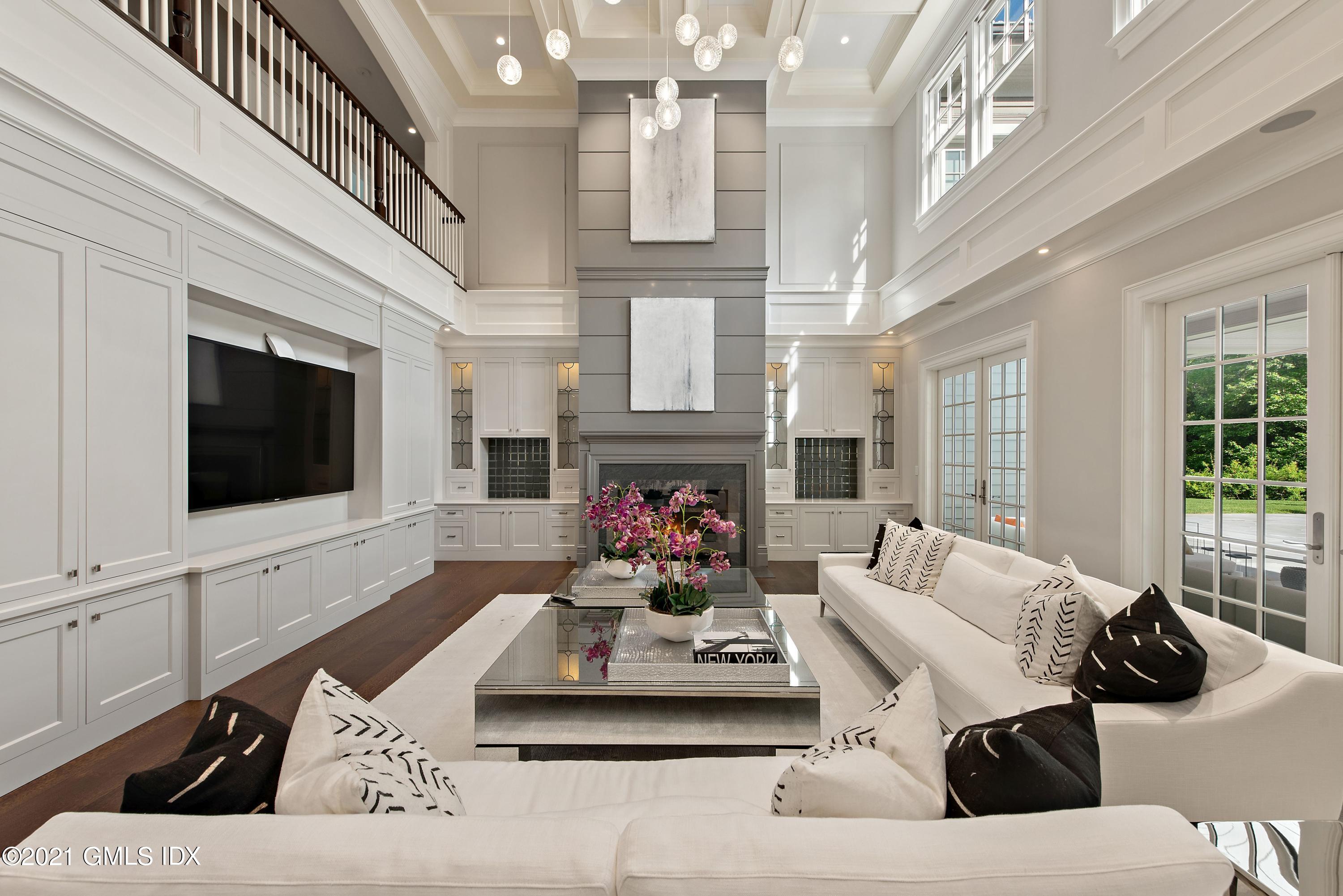 434 Riversville Road Greenwich, CT 06831 - Photo 7 of 47 a living room with furniture and a flat screen tv