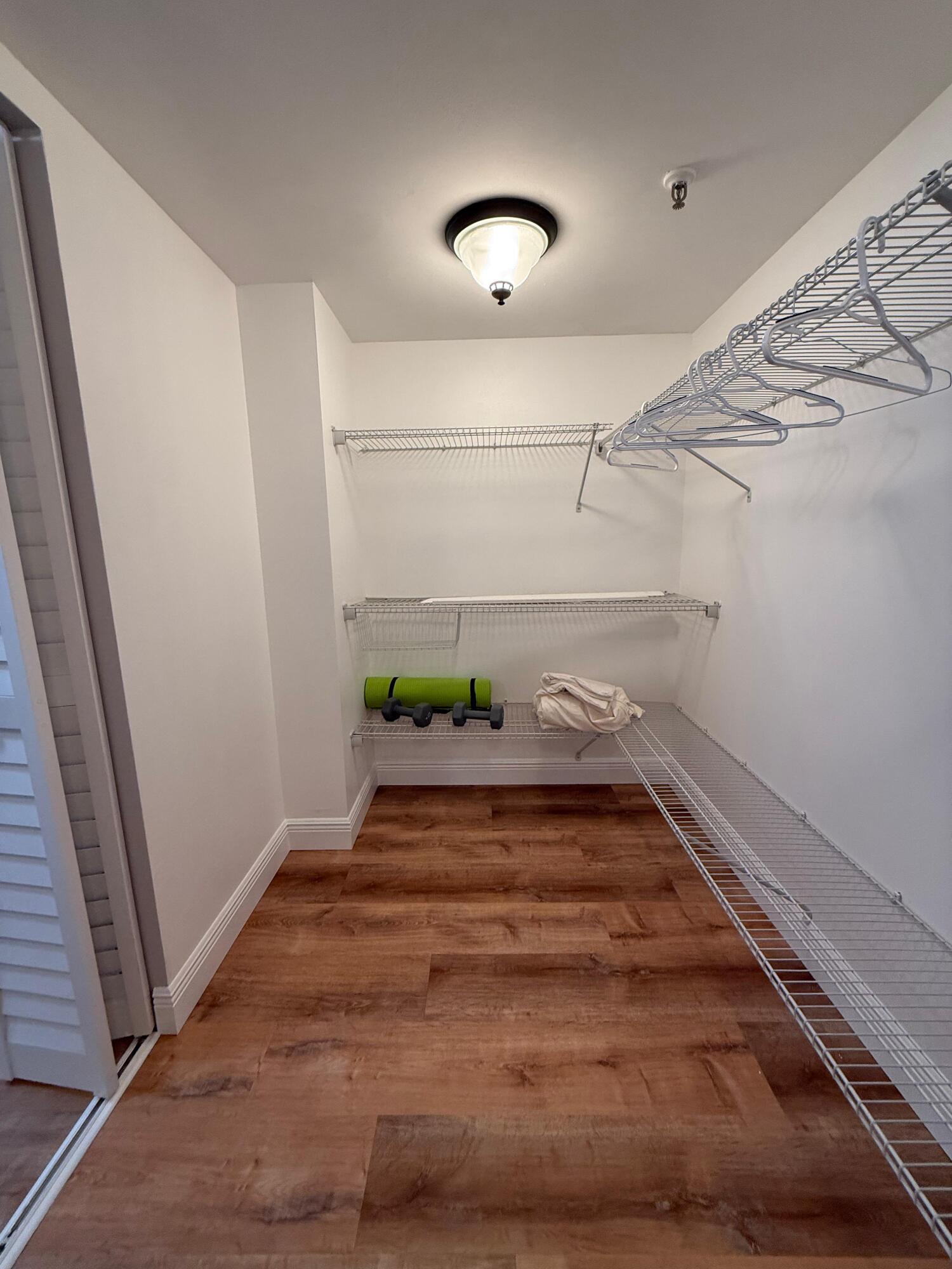 6372 La Costa Drive, Unit 306 Boca Raton, FL 33433 - Photo 14 of 23 a view of a room with wooden floor