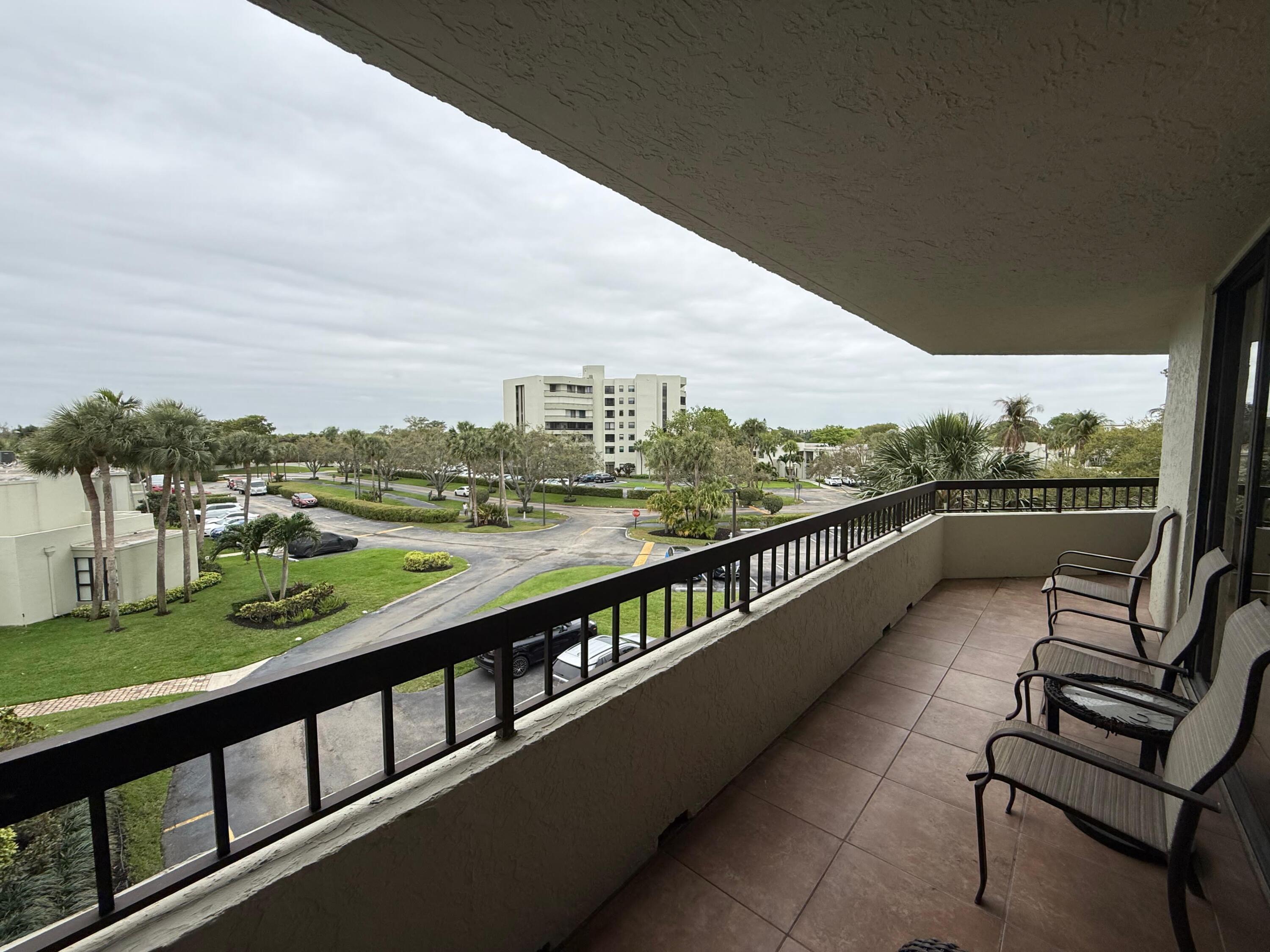 6372 La Costa Drive, Unit 306 Boca Raton, FL 33433 - Photo 22 of 23 a view of city from a balcony