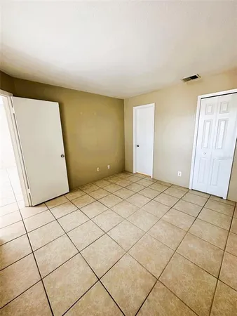 a view of a room & utility room