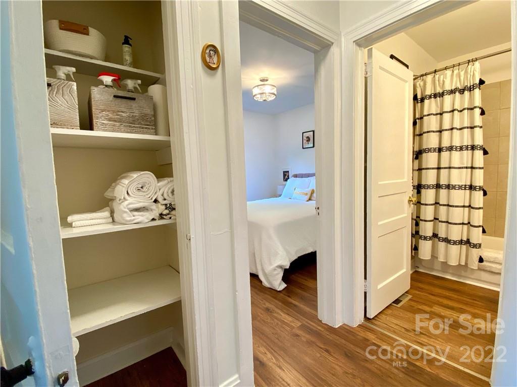 1240 Skyview Road Charlotte, NC 28208 - Photo 12 of 30 a bathroom with a sink and a mirror