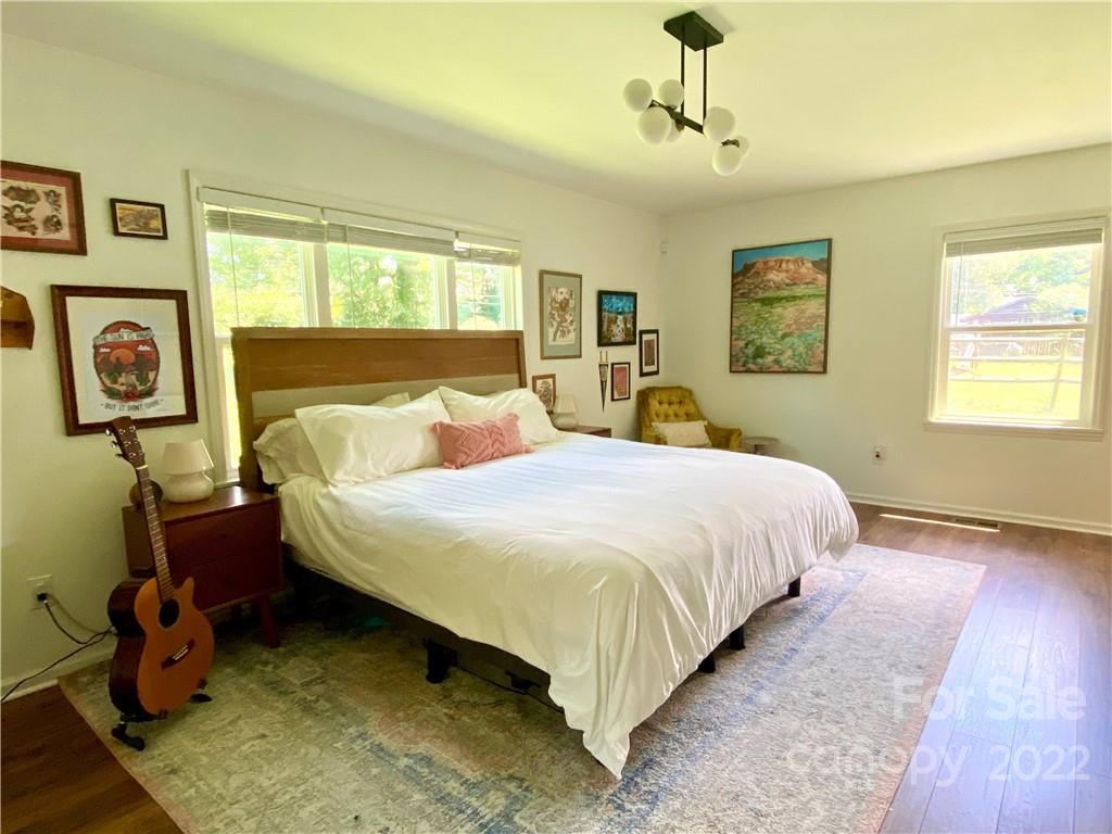 1240 Skyview Road Charlotte, NC 28208 - Photo 15 of 30 a bedroom with bed and window