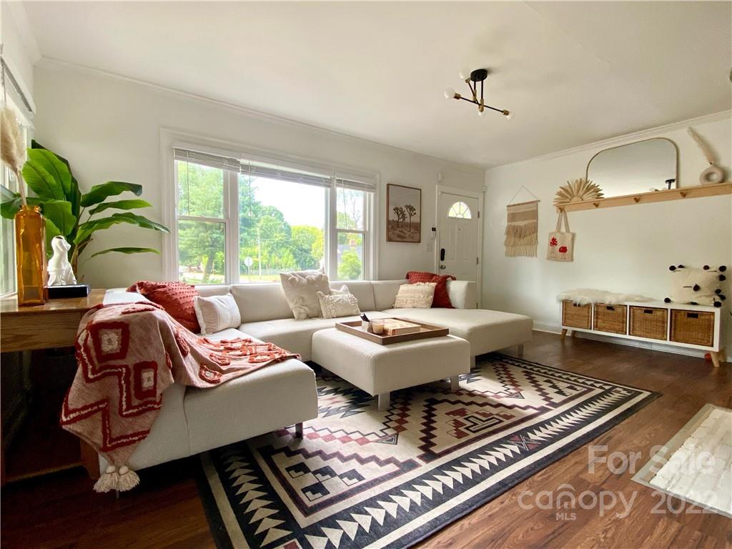 1240 Skyview Road Charlotte, NC 28208 - Photo 2 of 30 a living room with furniture and a rug