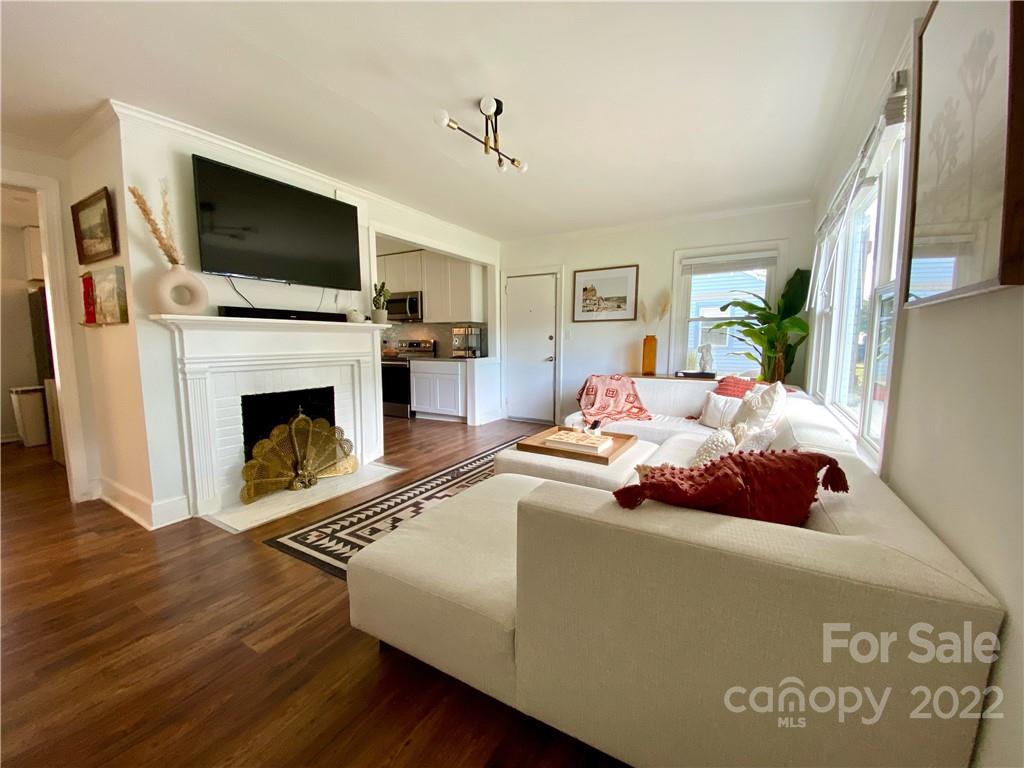 1240 Skyview Road Charlotte, NC 28208 - Photo 3 of 30 a bedroom with a bed and a flat screen tv