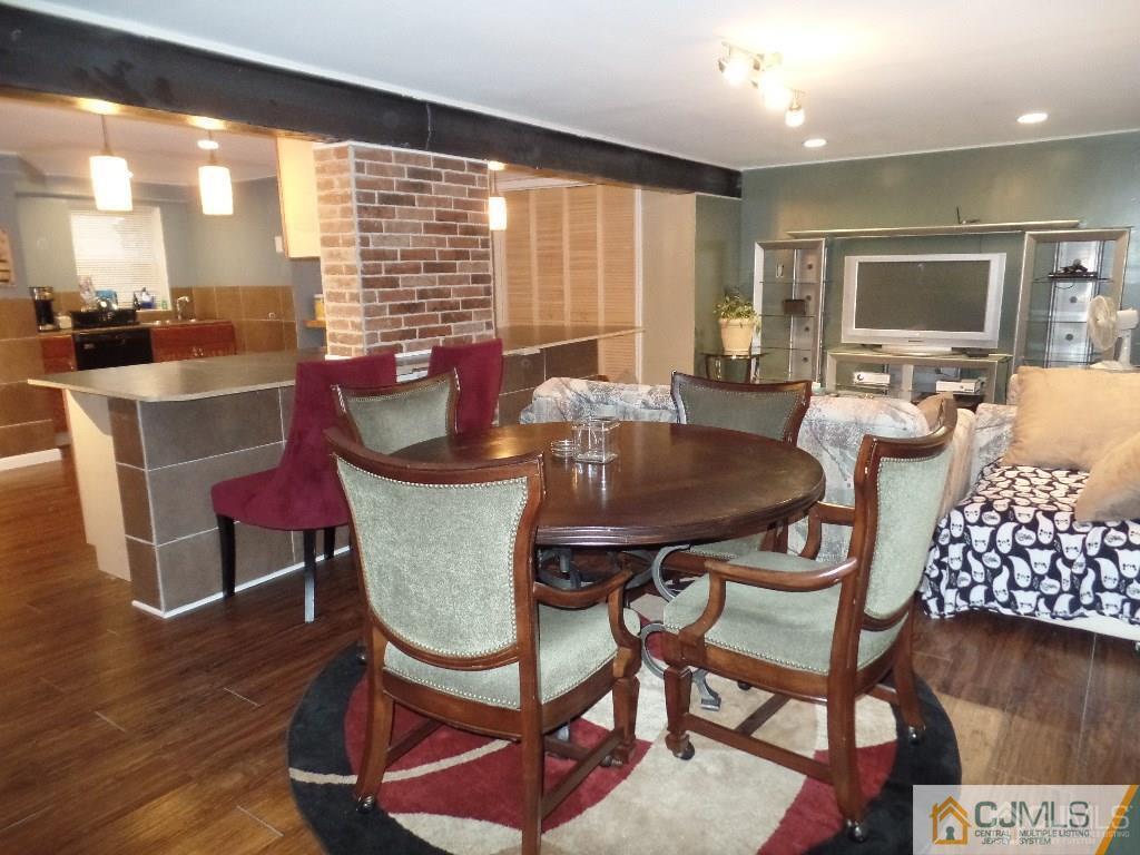 85 Jordan Road Colonia, NJ 07067 - Photo 1 of 17 a view of a dining room with furniture window and wooden floor