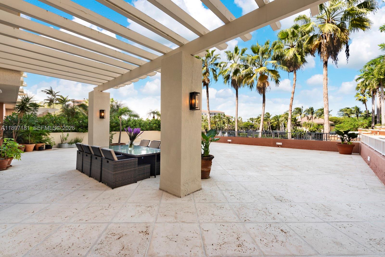 765 Crandon Boulevard, Unit 102 Key Biscayne, FL 33149 - Photo 1 of 37 a view of living room with patio