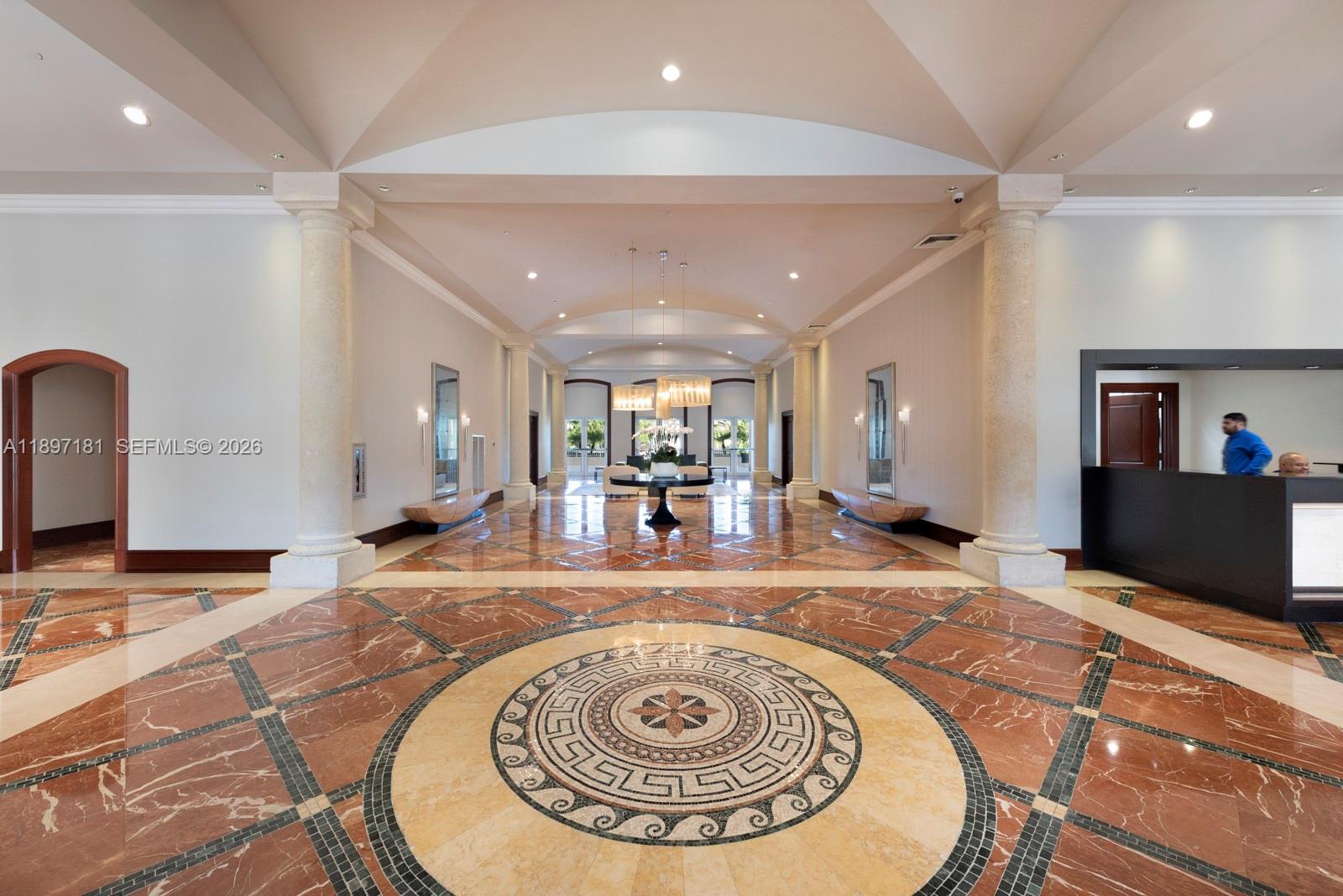 765 Crandon Boulevard, Unit 102 Key Biscayne, FL 33149 - Photo 29 of 37 a view of a living room and kitchen