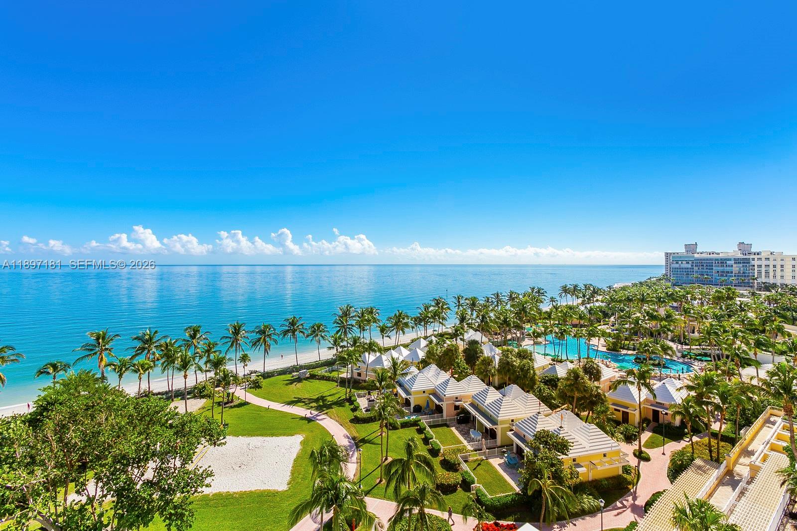 765 Crandon Boulevard, Unit 102 Key Biscayne, FL 33149 - Photo 30 of 37 a view of a yard