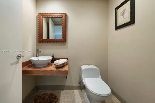 a spacious bedroom with a large bed and a large window