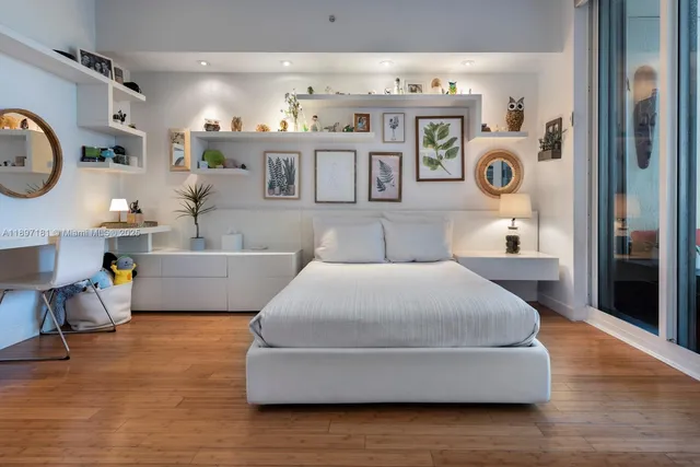a bathroom with a toilet a sink and bathtub