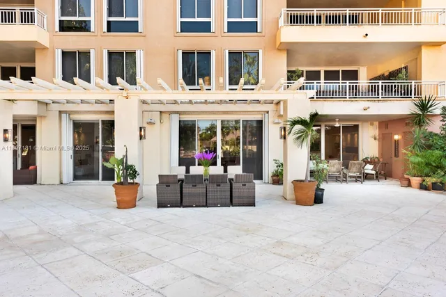 a view of a building with a yard