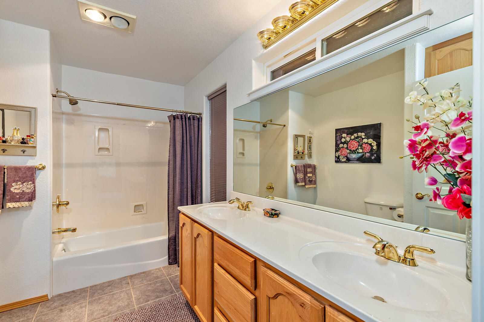 9996 Blackwell Road Central Point, OR 97502 - Photo 16 of 46 a bathroom with a tub sink and mirror