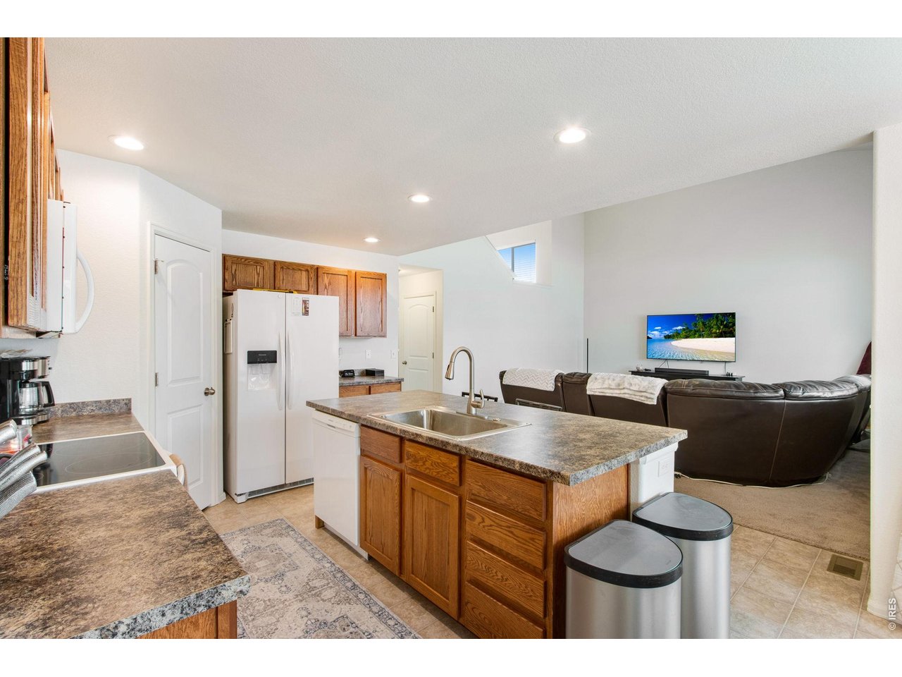 2671 Doe Rdg Way Johnstown, CO 80534 - Photo 16 of 37 Bright and open layout