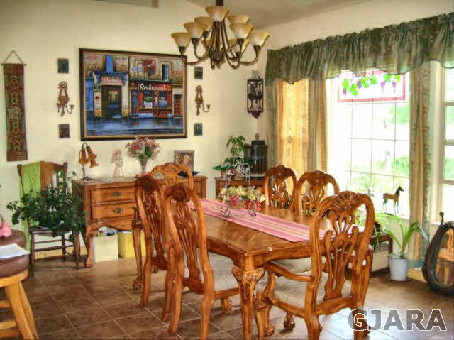 2913 El Torro Road Grand Junction, CO 81503 - Photo 3 of 9 a view of a dining room with furniture and window