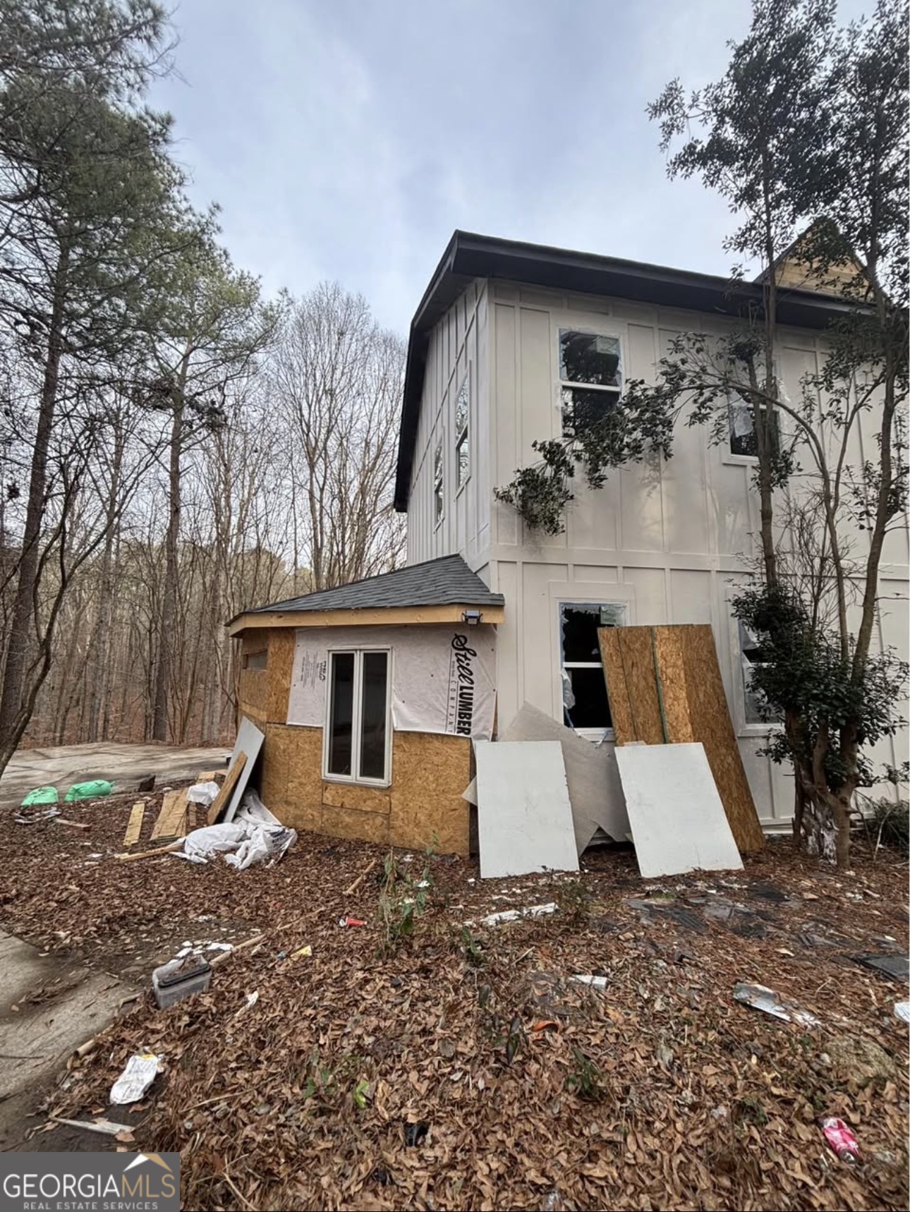 front view of a house with a yard