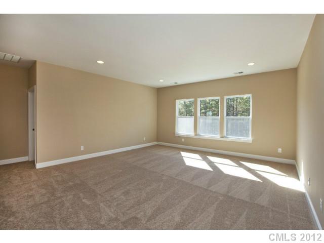86587 Arrington Road, Unit 101 Lancaster, SC 29720 - Photo 11 of 16 a view of an empty room with a window