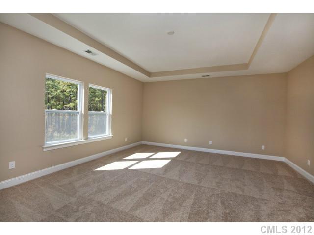 86587 Arrington Road, Unit 101 Lancaster, SC 29720 - Photo 12 of 16 a view of an empty room with a window