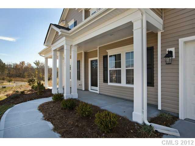 86587 Arrington Road, Unit 101 Lancaster, SC 29720 - Photo 3 of 16 a view of a house with backyard and garden