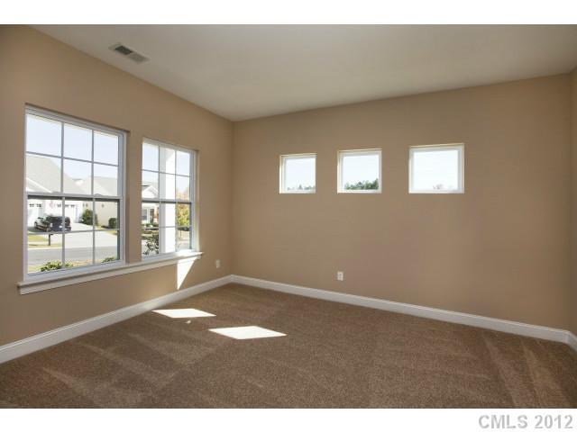 86587 Arrington Road, Unit 101 Lancaster, SC 29720 - Photo 5 of 16 a view of an empty room with a window